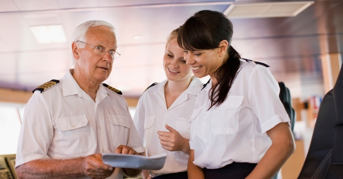 Ship's captain checks with his team the validity of his maritime licenses.