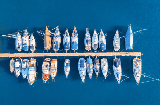 Aerial view of a dock with different ships registered in Panama