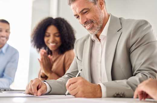 Businessman signs registration of his offshore company