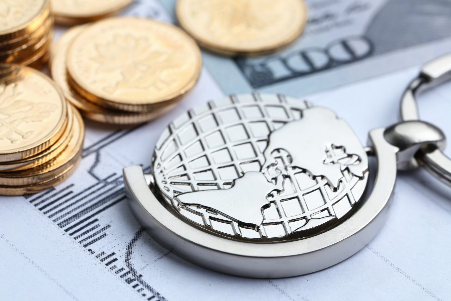 Offshore taxes with currencies and globe