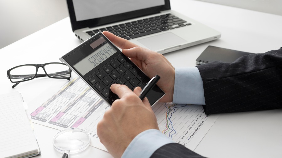 Individual reviewing their offshore taxes for their foreign company